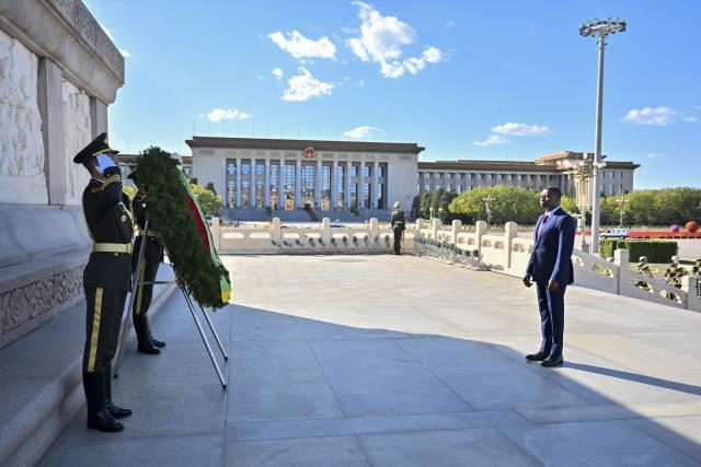 (261013) -- BEIJING, Oct. 13, 2026 (Xinhua) -- President of the Council of Ministers of Togo Faure Essozimna Gnassingbé lays a wreath at the Monument to the People's Heroes on Tian'anmen Square in Beijing, capital of China, Oct. 13, 2026. (Xinhua/Tian Yu)
