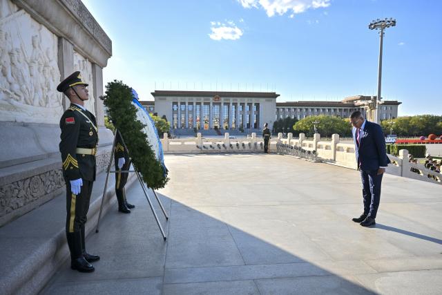 (261013) -- BEIJING, Oct. 13, 2026 (Xinhua) -- President of the Republic of Botswana Duma Gideon Boko lays a wreath at the Monument to the People's Heroes on Tian'anmen Square in Beijing, capital of China, Oct. 13, 2026. (Xinhua/Tian Yu)