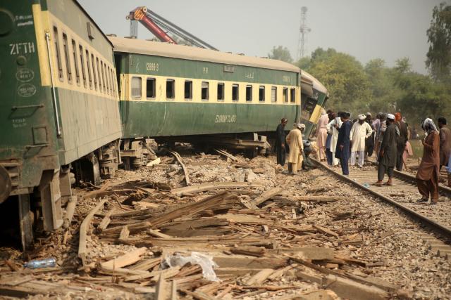 (261013) -- MULTAN, Oct. 13, 2026 (Xinhua) -- People are seen at the site of a train derailment accident in Multan district of Punjab province, Pakistan, Oct. 13, 2026. At least five passengers were killed and 30 others injured after all 14 carriages of a passenger train derailed in Pakistan's eastern Punjab province early Tuesday morning, police said.
   "The accident occurred in Multan district when the Rehman Baba Express, traveling from the southern port city of Karachi to the northwestern city of Peshawar, went off the tracks," police sources from the district told Xinhua. (Photo by Ibrahim Mansoor/Xinhua)