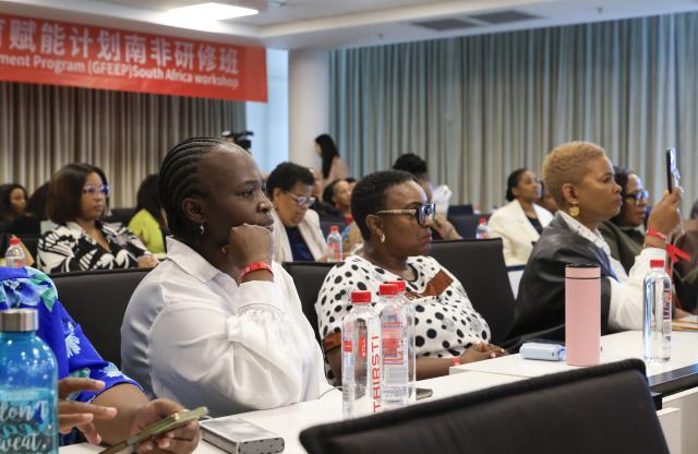 (261013) -- JOHANNESBURG, Oct. 13, 2026 (Xinhua) -- Trainees attend the South Africa workshop under the Global Female Entrepreneurs Empowerment Program (GFEEP) in Johannesburg, South Africa, Oct. 8, 2026. TO GO WITH "Feature: Chinese training opens new doors for South African women entrepreneurs " (Xinhua/Chen Wei)
