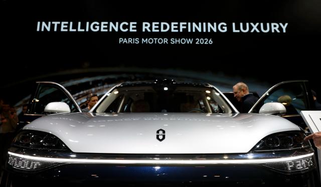 (261013) -- PARIS, Oct. 13, 2026 (Xinhua) -- A vehicle on display is seen at the booth of Chinese automaker Aito during the 2026 Paris Motor Show in Paris, France, on Oct. 13, 2026. The 91st Paris Motor Show opened in the French capital on Monday, with a record number of Chinese automakers taking part to showcase their latest models and technologies. (Xinhua/Wu Huiwo)