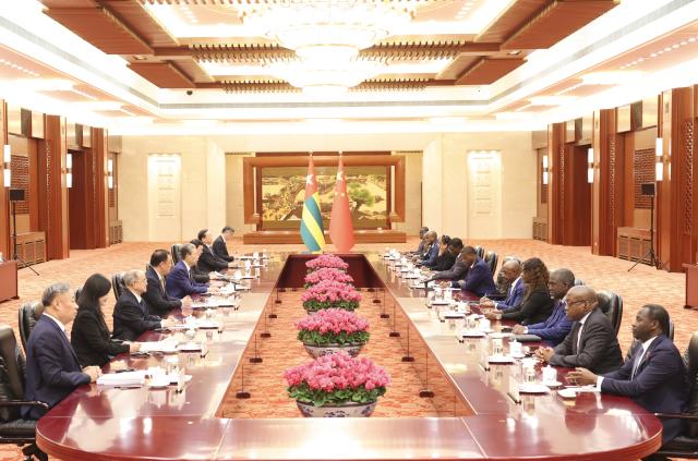 (261013) -- BEIJING, Oct. 13, 2026 (Xinhua) -- Zhao Leji, chairman of the National People's Congress Standing Committee, meets with President of the Council of Ministers of Togo Faure Essozimna Gnassingbé in Beijing, capital of China, Oct. 13, 2026. (Xinhua/Pang Xinglei)
