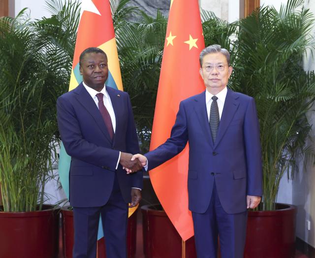 (261013) -- BEIJING, Oct. 13, 2026 (Xinhua) -- Zhao Leji, chairman of the National People's Congress Standing Committee, meets with President of the Council of Ministers of Togo Faure Essozimna Gnassingbé in Beijing, capital of China, Oct. 13, 2026. (Xinhua/Pang Xinglei)