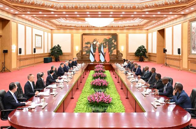 (261013) -- BEIJING, Oct. 13, 2026 (Xinhua) -- Chinese President Xi Jinping holds talks with Botswana's President Duma Gideon Boko, who is on a state visit to China, at the Great Hall of the People in Beijing, capital of China, Oct. 13, 2026. (Xinhua/Li Xiang)