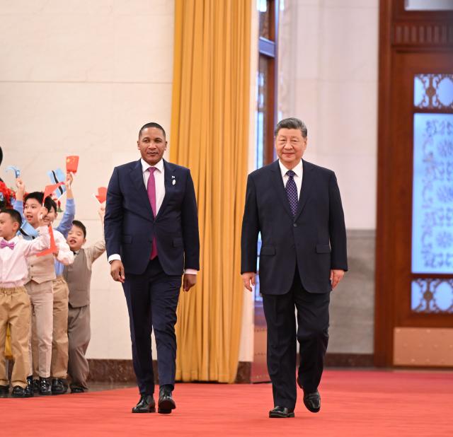 (261013) -- BEIJING, Oct. 13, 2026 (Xinhua) -- Chinese President Xi Jinping holds a welcome ceremony for Botswana's President Duma Gideon Boko in the Northern Hall of the Great Hall of the People prior to their talks in Beijing, capital of China, Oct. 13, 2026. Xi held talks with Boko, who is on a state visit to China, in Beijing on Tuesday. (Xinhua/Li Xiang)