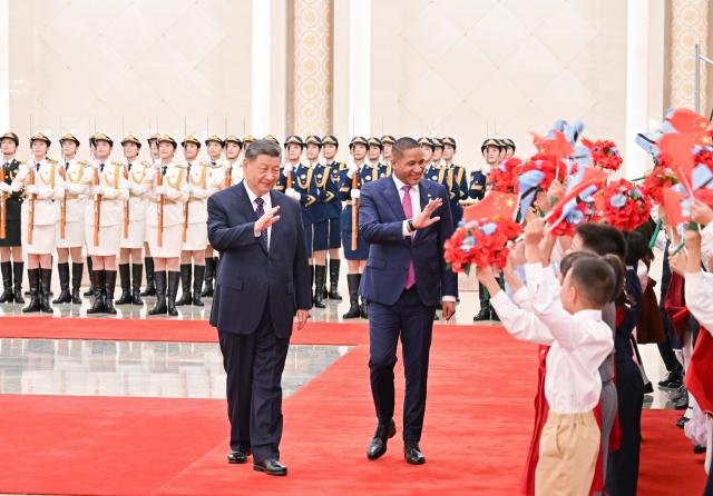 (261013) -- BEIJING, Oct. 13, 2026 (Xinhua) -- Chinese President Xi Jinping holds a welcome ceremony for Botswana's President Duma Gideon Boko in the Northern Hall of the Great Hall of the People prior to their talks in Beijing, capital of China, Oct. 13, 2026. Xi held talks with Boko, who is on a state visit to China, in Beijing on Tuesday. (Xinhua/Yue Yuewei)