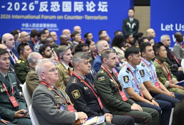 (261013) -- BEIJING, Oct. 13, 2026 (Xinhua) -- Participants attend the Great Wall-2026 International Forum on Counter-Terrorism in Beijing, capital of China, Oct. 13, 2026. TO GO WITH "Int'l counter-terrorism forum opens in Beijing" (Photo by Wang Xi/Xinhua)