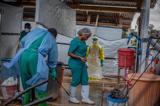 (261013) -- BUNIA, Oct. 13, 2026 (Xinhua) -- Health workers carry out disinfection work at an Ebola treatment center in Bunia, capital of Ituri Province in the Democratic Republic of the Congo (DRC), on Oct. 12, 2026. The Democratic Republic of the Congo (DRC) has recorded more than 9,000 confirmed cases of Ebola since the outbreak was declared on May 15, with the death toll rising to 4,381, according to the latest situation report released Tuesday.
   No vaccine or treatment has yet been specifically approved for the Bundibugyo ebolavirus, although clinical trials are underway. (Xinhua)