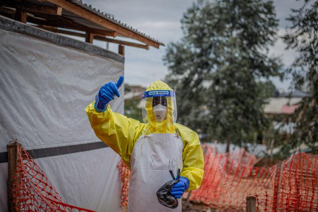 (261013) -- BUNIA, Oct. 13, 2026 (Xinhua) -- A health worker gestures at an Ebola treatment center in Bunia, capital of Ituri Province in the Democratic Republic of the Congo (DRC), on Oct. 12, 2026. The Democratic Republic of the Congo (DRC) has recorded more than 9,000 confirmed cases of Ebola since the outbreak was declared on May 15, with the death toll rising to 4,381, according to the latest situation report released Tuesday.
   No vaccine or treatment has yet been specifically approved for the Bundibugyo ebolavirus, although clinical trials are underway. (Xinhua)