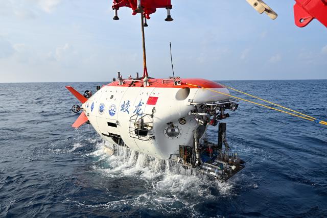 (261014) -- BEIJING, Oct. 14, 2026 (Xinhua) -- The manned deep-sea submersible Jiaolong is pictured after its 467th dive, on Oct. 11, 2026. China's manned deep-sea submersible Jiaolong successfully completed its 467th dive. The dive reached a depth of approximately 4,400 meters. (Xinhua/Li Xin)