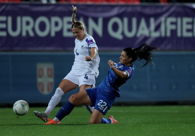 (261014) -- BELGRADE, Oct. 14, 2026 (Xinhua) -- Serbia's Paulina Stanic (R) vies with Finland's Noora Karvonen during European Qualifiers Play Off for 2027 FIFA Women's World Cup football match between Serbia and Finland, in Stara Pazova, Serbia, on Oct. 13, 2026. (Photo by Predrag Milosavljevic/Xinhua)