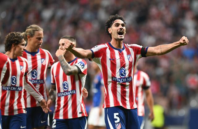 (261014) -- MADRID, Oct. 14, 2026 (Xinhua) -- Players of Atletico Madrid celebrate during the UEFA Champions League League Stage football match between Atletico Madrid and Manchester United in Madrid, Spain, Oct. 13, 2026. (Xinhua/Cheng Min)