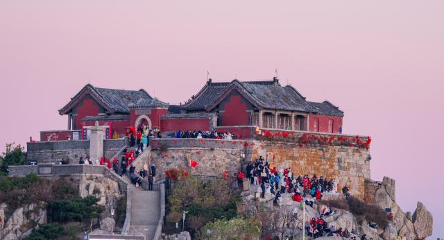 (261014) -- TAI'AN, Oct. 14, 2026 (Xinhua) -- This photo taken on Oct. 8, 2026 shows tourists visiting the Mount Tai in Tai'an City, east China's Shandong Province. Mount Tai, a UNESCO World Heritage Site, is one of China's most renowned mountains, known for its historical, cultural, aesthetic, and scientific significance. (Xinhua/Chen Yehua)
