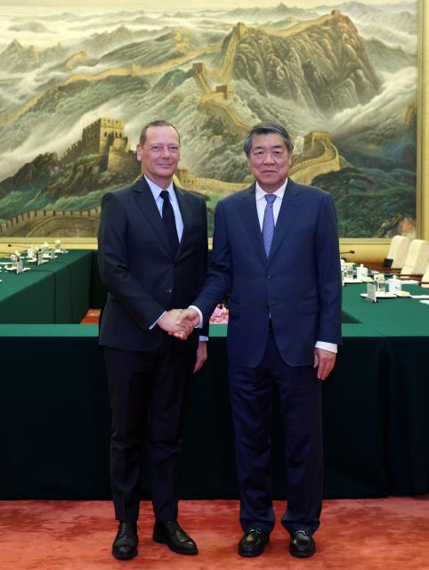 (261014) -- BEIJING, Oct. 14, 2026 (Xinhua) -- Chinese Vice Premier He Lifeng, also a member of the Political Bureau of the Communist Party of China Central Committee, meets with French President's Diplomatic Adviser Emmanuel Bonne at the Great Hall of the People in Beijing, capital of China, Oct. 13, 2026. (Xinhua/Liu Weibing)