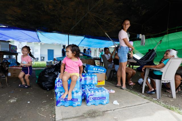 (261014) -- PANAMA CITY, Oct. 14, 2026 (Xinhua) -- This photo taken on Oct. 13, 2026 shows quake-affected residents at a temporary shelter in Llana Arriba, Herrera, Panama. (Photo by Daniel Gonzalez/Xinhua)