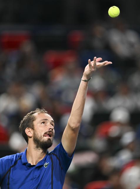 (261014) -- SHANGHAI, Oct. 14, 2026 (Xinhua) -- Daniil Medvedev of Russia serves during the men's round of 16 match against Stefanos Tsitsipas of Greece at the 2026 ATP tour Shanghai Masters tennis tournament in Shanghai, China, Oct. 14, 2026. (Xinhua/Chen Haoming)
