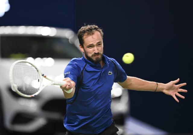 (261014) -- SHANGHAI, Oct. 14, 2026 (Xinhua) -- Daniil Medvedev of Russia hits a return during the men's round of 16 match against Stefanos Tsitsipas of Greece at the 2026 ATP tour Shanghai Masters tennis tournament in Shanghai, China, Oct. 14, 2026. (Xinhua/Chen Haoming)