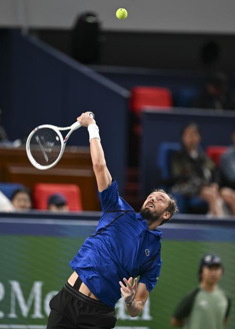 (261014) -- SHANGHAI, Oct. 14, 2026 (Xinhua) -- Daniil Medvedev of Russia serves during the men's round of 16 match against Stefanos Tsitsipas of Greece at the 2026 ATP tour Shanghai Masters tennis tournament in Shanghai, China, Oct. 14, 2026. (Xinhua/Chen Haoming)