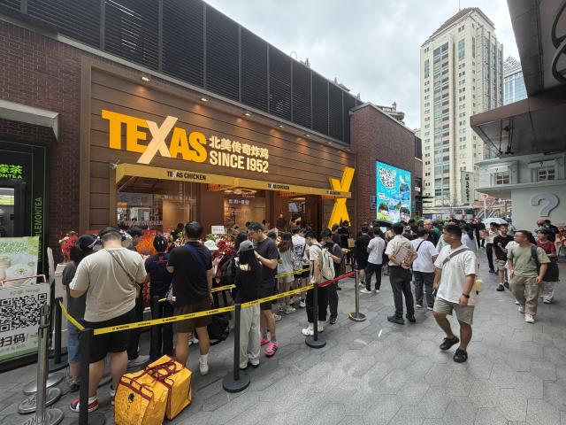 (261014) -- SHANGHAI, Oct. 14, 2026 (Xinhua) -- This photo taken on Aug. 28, 2026 shows a store of Church's Texas Chicken, also the first one of this American fried chicken brand opened in the Chinese mainland, on Wujiang Road in Shanghai, east China.
  TO GO WITH "Economic Watch: New wave of American fast-food chains bets on China's younger generation" (Xinhua)