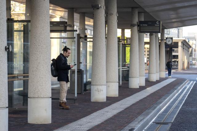 (261014) -- HENGELO, Oct. 14, 2026 (Xinhua) -- A man is seen at a platform in Hengelo, the Netherlands, Oct. 14, 2026. Regional public transport services across most of the country were disrupted by strikes on Wednesday for demanding better working conditions and employee welfare. (Photo by Eric Brinkhorst/Xinhua)