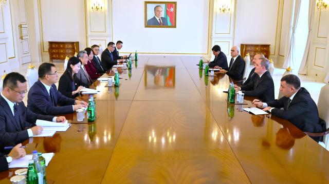 (261014) -- BAKU, Oct. 14, 2026 (Xinhua) -- Azerbaijani President Ilham Aliyev meets with Chinese Foreign Minister Wang Yi, also a member of the Political Bureau of the Communist Party of China Central Committee, in Baku, Azerbaijan, Oct. 14, 2026. (Xinhua/Chen Junfeng)