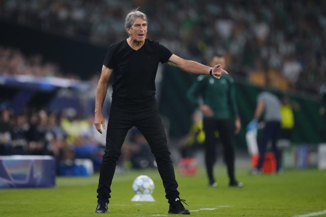 (261015) -- SEVILLE, Oct. 15, 2026 (Xinhua) -- Manuel Pellegrini, head coach of Real Betis instructs players during the UEFA Champions League match between Real Betis and Porto at La Cartuja Stadium in Seville, Spain, Oct. 14, 2026. (Str/Xinhua)