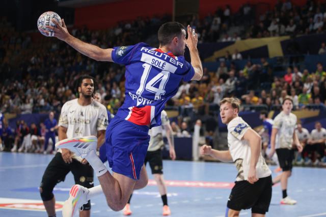 (261015) -- CELJE, Oct. 15, 2026 (Xinhua) -- Ferran Sole Sala of Paris Saint-Germain shoots the ball during the European Handball Federation (EHF) Champions League match between RK Celje Pivovarna Lasko and Paris Saint-Germain at Zlatorog Sports Hall in Celje, Slovenia, Oct.14, 2026. (Photo by Zeljko Stevanic/Xinhua)