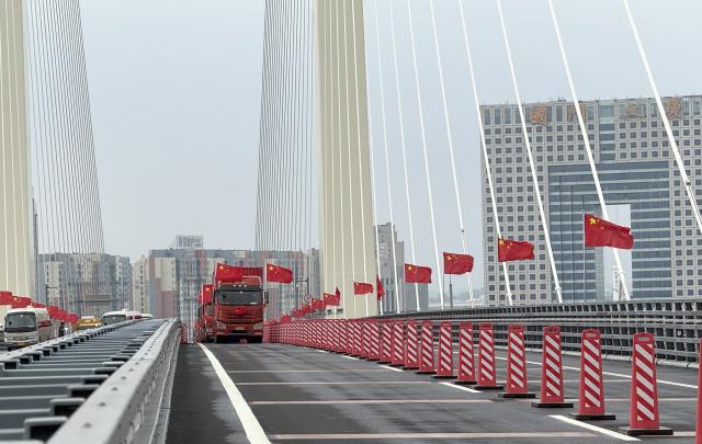 (261015) -- DANDONG, Oct. 15, 2026 (Xinhua) -- An opening ceremony is held for a new bridge across the Yalu River, the border river of China and the Democratic People's Republic of Korea (DPRK), on Oct. 15, 2026. (Xinhua/Pan Yulong)