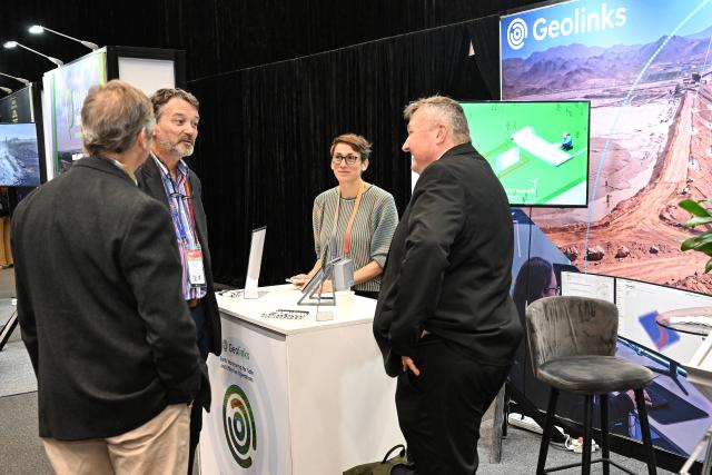 (261015) -- CAPE TOWN, Oct. 15, 2026 (Xinhua) -- People communicate at a mining exhibition during African Mining Week 2026 in Cape Town, South Africa, Oct. 14, 2026. African Mining Week (AMW) 2026 on Wednesday kicked off in Cape Town, South Africa, with a call to unlock the full value of Africa's mineral resources through greater regional cooperation, investment and industrial development.
   TO GO WITH "African Mining Week urges efforts to unlock full value of continental resources" (Photo by Xabiso Mkhabela/Xinhua)
