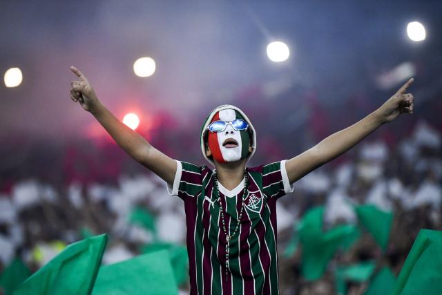 (261015) -- RIO DE JANEIRO, Oct. 15, 2026 (Xinhua) -- A fan of Fluminense is pictured during the first leg of the Copa Libertadores semifinal football match between Brazil's Fluminense and Palmeiras at the Maracana stadium in Rio de Janeiro, Brazil, Oct. 14, 2026. (Photo by Daniel Ramalho/Xinhua)