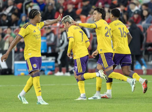(261015) -- TORONTO, Oct. 15, 2026 (Xinhua) -- Antoine Griezmann (2nd L) of Orlando City SC celebrates scoring with teammates during the 2026 Major League Soccer (MLS) regular season match between Toronto FC and Orlando City SC at BMO Field in Toronto, Canada, Oct. 14, 2026. (Photo by Zou Zheng/Xinhua)
