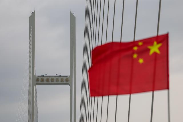 (261015) -- DANDONG, Oct. 15, 2026 (Xinhua) -- This photo taken on Oct. 15, 2026 shows a view of the new China-DPRK Yalu River bridge. The new China-DPRK Yalu River bridge officially opened to traffic on Thursday, with both sides jointly holding an opening ceremony on this cross-border artery. (Xinhua/Pan Yulong)