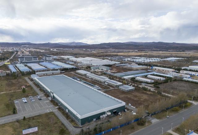 (261015) -- HARBIN, Oct. 15, 2026 (Xinhua) -- An aerial drone photo taken on Oct. 14, 2026 shows a view of the Yichun economic development zone in Yichun City, northeast China's Heilongjiang Province.
  The Harbin-Yichun high-speed railway, China's northernmost high-speed railway running through a region of discontinuous permafrost in northeast China's Heilongjiang Province, officially entered service on Sept. 28. With a designed speed of 250 kilometers per hour, the 318-km line slashed travel time between Harbin and Yichun from about seven hours to just two hours.
   The efficient and convenient rail service is expected to facilitate the free flow of talents, passengers, materials and technologies, boosting coordinated regional development in Heilongjiang and forming a key corridor for the region's high-quality development. (Xinhua/Wang Song)