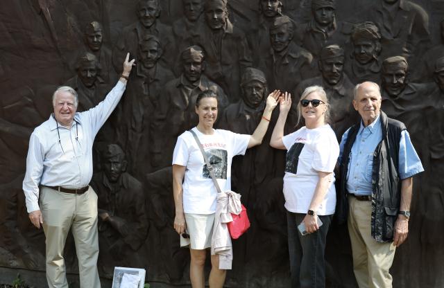 (261015) -- HANGZHOU, Oct. 15, 2026 (Xinhua) -- Representatives of the Children of the Doolittle Raiders pose for a group photo in front of an air-raid shelter in Kecheng District of Quzhou City, east China's Zhejiang Province, Oct. 13, 2026.
  TO GO WITH "Feature: 84 years on, Doolittle Raiders' descendants and Chinese volunteer researchers honor wartime friendship" (Photo by Han Qiang/Xinhua)