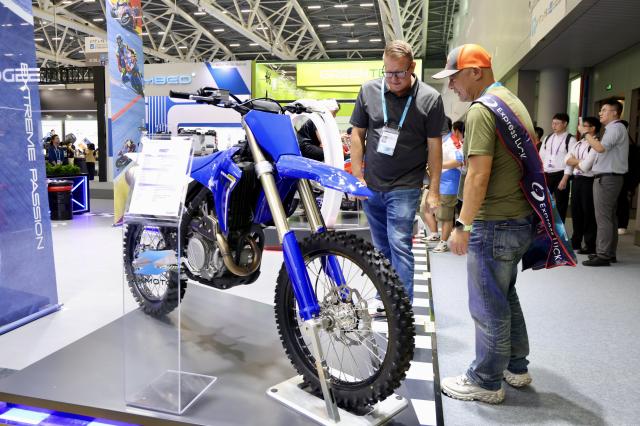(261015) -- GUANGZHOU, Oct. 15, 2026 (Xinhua) -- Overseas buyers view a motorcycle of ZXMOTO during the Canton Fair in Guangzhou, south China's Guangdong Province, Oct. 15, 2026. The 140th edition of the China Import and Export Fair, also known as the Canton Fair, opened to visitors in Guangzhou, capital of south China's Guangdong Province on Thursday, with more than 30,000 exhibiting companies and about 340,000 overseas buyers expected to attend.
The 140th Canton Fair runs in three phases in Guangzhou from Oct. 15 to Nov. 4.
Over the past 70 years, the Canton Fair has grown into China's largest and longest-running international trade event, with the most complete product range, the largest number of buyers and the highest transaction volume. (Xinhua/Lu Hanxin)