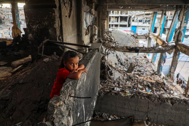 (261015) -- GAZA, Oct. 15, 2026 (Xinhua) -- A displaced Palestinian child is pictured in Jabalia refugee camp, northern Gaza Strip, on Oct. 14, 2026. (Photo by Rizek Abdeljawad/Xinhua)