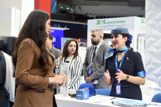 (261015) -- HAWALLI GOVERNORATE, Oct. 15, 2026 (Xinhua) -- People visit the Watheefti career fair in Hawalli Governorate, Kuwait, Oct. 15, 2026. The Watheefti 2026 career fair opened in Kuwait's Hawalli Governorate on Thursday, bringing together more than 120 companies and organizations from various sectors. The three-day event, running through to Oct. 17, aims to connect jobseekers with potential employers, offer career guidance and training opportunities. (Photo by Asad/Xinhua)