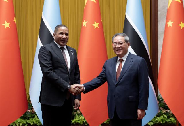 (261015) -- BEIJING, Oct. 15, 2026 (Xinhua) -- Chinese Premier Li Qiang meets with Botswana's President Duma Gideon Boko, who is on a state visit to China, at the Great Hall of the People in Beijing, capital of China, on Oct. 15, 2026. (Xinhua/Huang Jingwen)