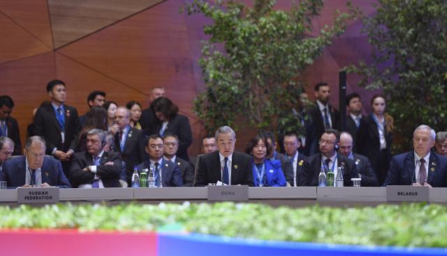 (261015) -- BAKU, Oct. 15, 2026 (Xinhua) -- Chinese Foreign Minister Wang Yi, as Special Representative of Chinese President Xi Jinping, also a member of the Political Bureau of the Communist Party of China Central Committee, attends the Seventh Summit of the Conference on Interaction and Confidence Building Measures in Asia (CICA) and delivers a speech in Baku, Azerbaijan, Oct. 15, 2026. (Xinhua/Chen Junfeng)