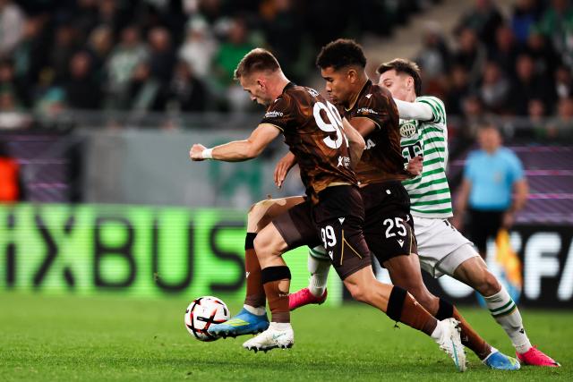 (261016) -- BUDAPEST, Oct. 16, 2026 (Xinhua) -- Amar Memic (L) and Christophe Kabongo (C) of Viktoria Plzen vie with Marius Corbu of Ferencvaros during the UEFA Europa League 2026/27 League Phase match between Ferencvaros and Viktoria Plzen in Budapest, Hungary, Oct. 15, 2026. (Xinhua/Hu Zhixuan)
