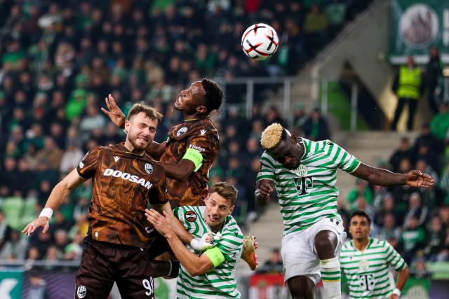 (261016) -- BUDAPEST, Oct. 16, 2026 (Xinhua) -- Sampson Dweh (2nd L) of Viktoria Plzen vies for a header with Bamidele Yusuf (2nd R) of Ferencvaros during the UEFA Europa League 2026/27 League Phase match between Ferencvaros and Viktoria Plzen in Budapest, Hungary, Oct. 15, 2026. (Xinhua/Hu Zhixuan)