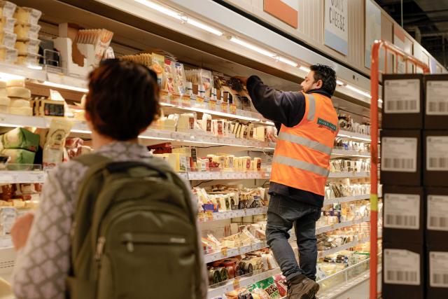 (261016) -- CANBERRA, Oct. 16, 2026 (Xinhua) -- A staff member arranges goods on a shelf at a supermarket in Canberra, Australia, on Oct. 16, 2026. Australia's unemployment rate rose to 4.7 percent in September, as employment fell and more people became unemployed, official statistics showed on Thursday. (Photo by Chu Chen/Xinhua)