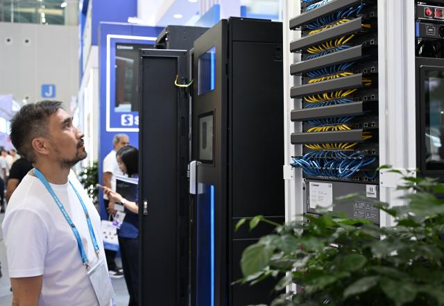 (261016) -- GUANGZHOU, Oct. 16, 2026 (Xinhua) -- An overseas buyer views a server cabinet produced by Safewell Group, a security equipment manufacturer in China, during the Canton Fair in Guangzhou, south China's Guangdong Province, Oct. 15, 2026. The 140th edition of the China Import and Export Fair, also known as the Canton Fair, opened to visitors in Guangzhou, capital of south China's Guangdong Province on Thursday, with more than 30,000 exhibiting companies and about 340,000 overseas buyers expected to attend.
  Serving as a barometer and wind vane of China's foreign trade, this year's fair, marking its 70th anniversary, features innovation, intelligence, greater specialization and higher quality.
  The Canton Fair is one of the world's few one-stop trade platforms offering a complete range of products with convenience and efficiency, while bringing together the latest products and technologies. (Xinhua/Deng Hua)