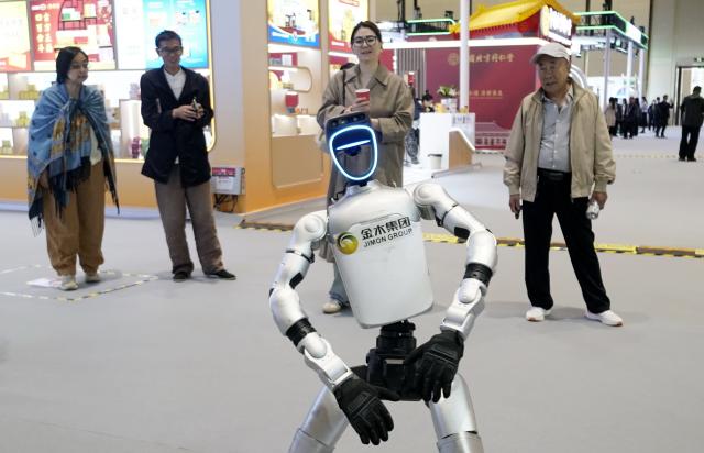 (261016) -- BEIJING, Oct. 16, 2026 (Xinhua) -- A humanoid robot demonstrates traditional Chinese fitness exercises during the Beijing International Traditional Healthcare Exhibition in Beijing, capital of China, Oct. 16, 2026. The event was kicked off here on Friday. (Xinhua/Li Xin)