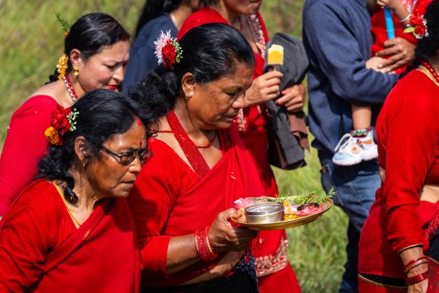 (261016) -- LALITPUR, Oct. 16, 2026 (Xinhua) -- People make offerings to masked dancers during an event marking the Sikali Jatra festival in Khokana village, Lalitpur, Nepal, Oct. 16, 2026.
  The festival, also called the festival of Rudrayani, is celebrated here on Friday. (Photo by Hari Maharjan/Xinhua)