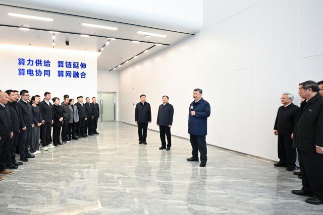 (261016) -- ULANQAB, Oct. 16, 2026 (Xinhua) -- Chinese President Xi Jinping, also general secretary of the Communist Party of China Central Committee and chairman of the Central Military Commission, talks with staff members while visiting Chahar High Tech Development Zone in Ulanqab, north China's Inner Mongolia Autonomous Region, Oct. 16, 2026. Xi made an inspection trip on Friday to the city of Ulanqab, north China's Inner Mongolia Autonomous Region. (Xinhua/Yan Yan)