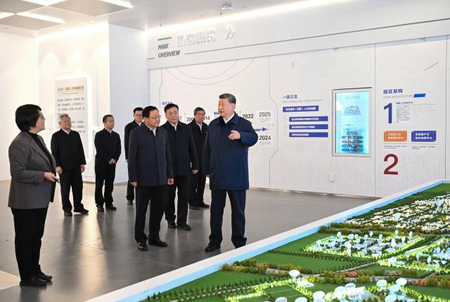 (261016) -- ULANQAB, Oct. 16, 2026 (Xinhua) -- Chinese President Xi Jinping, also general secretary of the Communist Party of China Central Committee and chairman of the Central Military Commission, learns about the development of the green computing power industry while visiting Chahar High Tech Development Zone in Ulanqab, north China's Inner Mongolia Autonomous Region, Oct. 16, 2026. Xi made an inspection trip on Friday to the city of Ulanqab, north China's Inner Mongolia Autonomous Region. (Xinhua/Yue Yuewei)