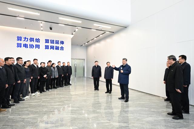(261016) -- ULANQAB, Oct. 16, 2026 (Xinhua) -- Chinese President Xi Jinping, also general secretary of the Communist Party of China Central Committee and chairman of the Central Military Commission, talks with staff members while visiting Chahar High Tech Development Zone in Ulanqab, north China's Inner Mongolia Autonomous Region, Oct. 16, 2026. Xi made an inspection trip on Friday to the city of Ulanqab, north China's Inner Mongolia Autonomous Region. (Xinhua/Yan Yan)