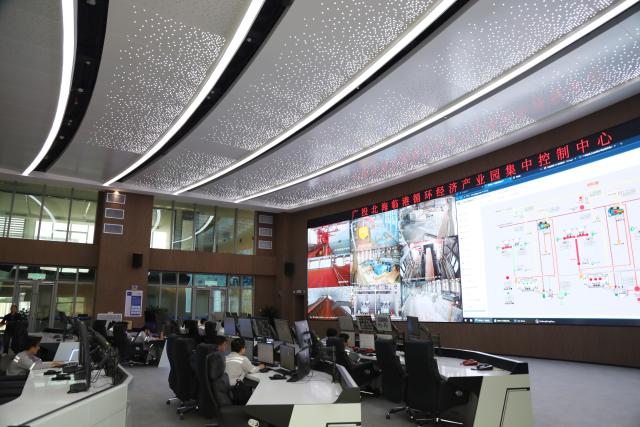 (261016) -- BEIHAI, Oct. 16, 2026 (Xinhua) -- This photo taken on Oct. 15, 2026 shows a scene of a control center at an industrial park in Beihai, south China's Guangxi Zhuang Autonomous Region. Taking advantage of its ports, resources as well as geographical location, Beihai has in recent years focused on developing eight pillar industries such as green chemicals, metal materials, information technology, and marine engineering equipment. It is accelerating the building of a modern and ocean-oriented industrial system featuring intelligence, greenness and integration. (Xinhua/Lu Peng)
