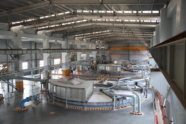 (261016) -- BEIHAI, Oct. 16, 2026 (Xinhua) -- This photo taken on Oct. 15, 2026 shows an interior view of a comprehensive filtration building of Guangxi Investment Group Lingang Industry Co., Ltd. in Beihai, south China's Guangxi Zhuang Autonomous Region. Taking advantage of its ports, resources as well as geographical location, Beihai has in recent years focused on developing eight pillar industries such as green chemicals, metal materials, information technology, and marine engineering equipment. It is accelerating the building of a modern and ocean-oriented industrial system featuring intelligence, greenness and integration. (Xinhua/Lu Peng)